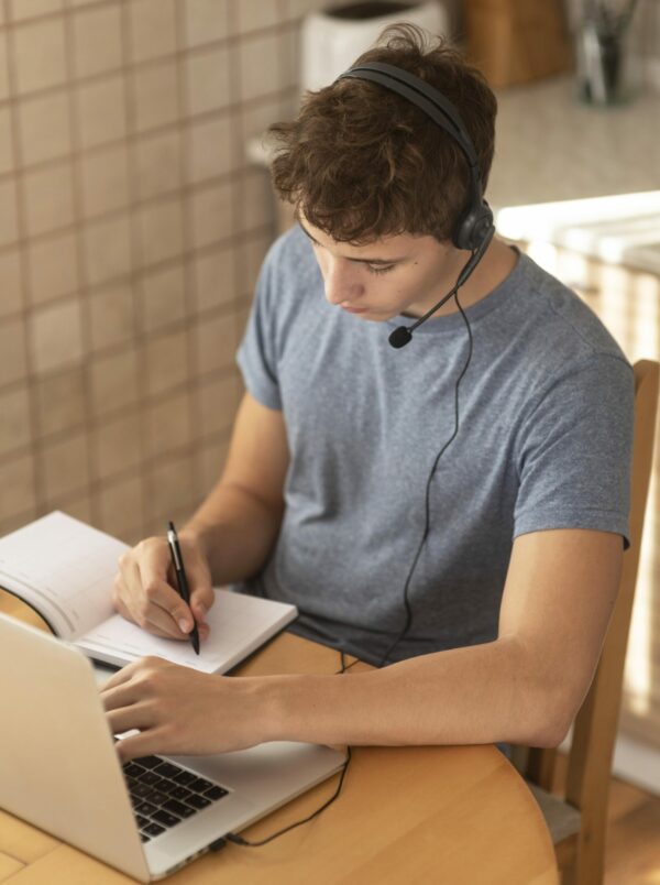 Man Working Kitchen Home During Quarantine with Laptop